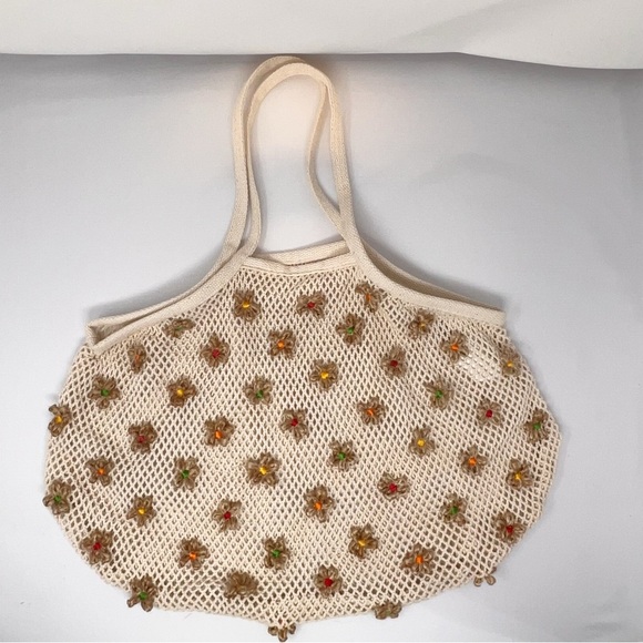Urban outfitters- Knit bag with flowers never used - Picture 5 of 10